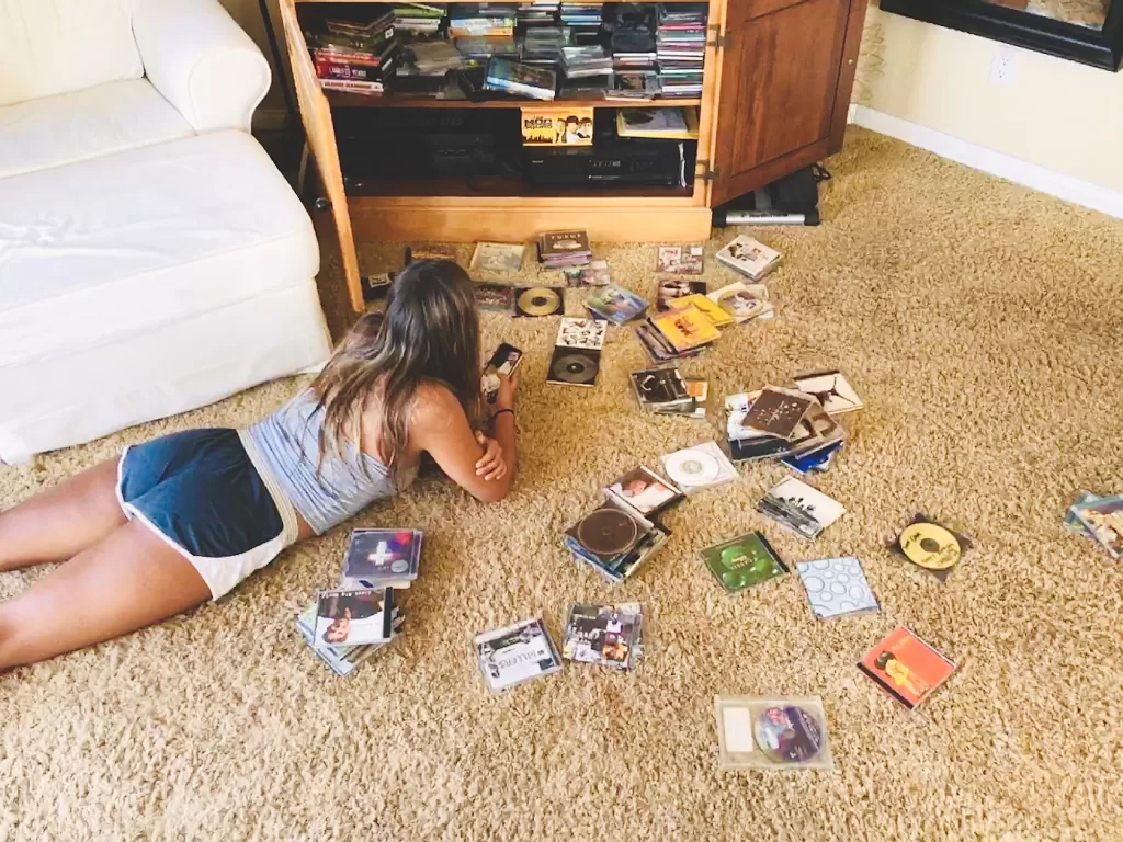 girl laying on the floor listening to music with a 2023 11 27 05 28 26 utc